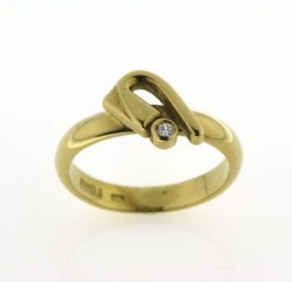 Billede af Ring (gl. vielsesring) påloddet pynt, syn. sten 2 mm. 8 kt.