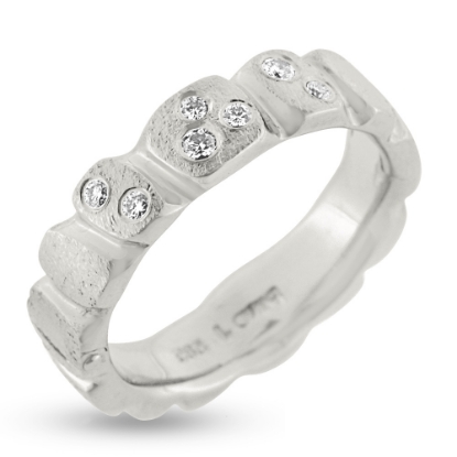 Billede af Ring med felter, 7  brill. 3*0,01 + 3*0,02 + 1*0,03 w/vs. 14 kt. hvg. (gigtring)