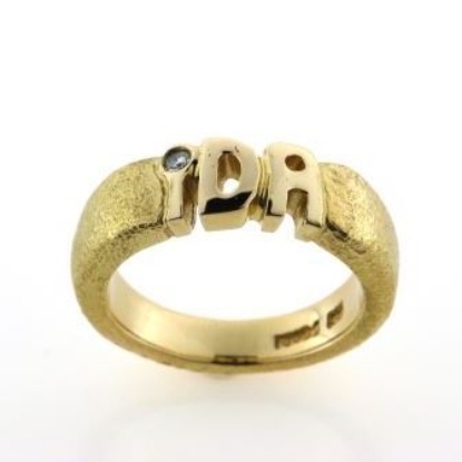 Billede af 1 ring, udsavet "IDA" brill. 0,03 w/vs. 14 kt. 