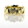 Billede af Ring hjerter (hjertering) hamret overflade, 1. hjerte fattet med 12 brill. 14 kt.