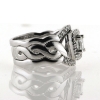 Billede af Ring 3 delt fattet med princess cut 0,40 tw/vs. + 16* 0,015 w/vs. + 18* 0,01 w/vs. 14 kt. hvg.