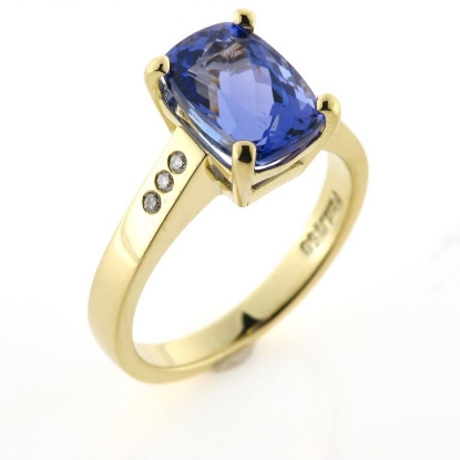Billede af Ring 4 grab. fatning, fattet Tanzanit  og 6 brill. a 0,01 w/vs. 18 kt.