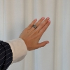 Billede af By Birdie Zeus Dubeca Aqua Raw ring sort rhodineret sølv og 14kt guld, aquamarin og brill. 0,05 ct str. 56