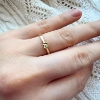 Billede af Lux Ring 4 grab. brill. 0,10 w/pi. 8 kt. 