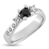 Ring rk. ring  1*0,51 ct. sort, 2*0,12 ct., 2*0,06 ct. + 4* 0,04 ct.  w/vs. 14 kt. hvg.