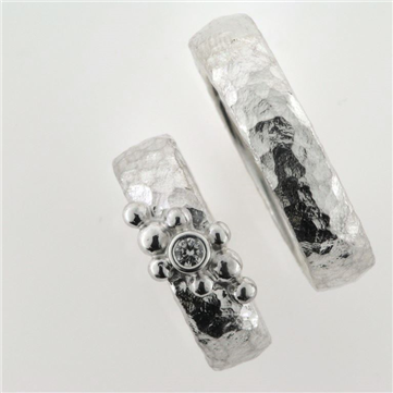 1 par vielsesringe, damering fattet med brill. 0,10 w/vs. 925s sølv